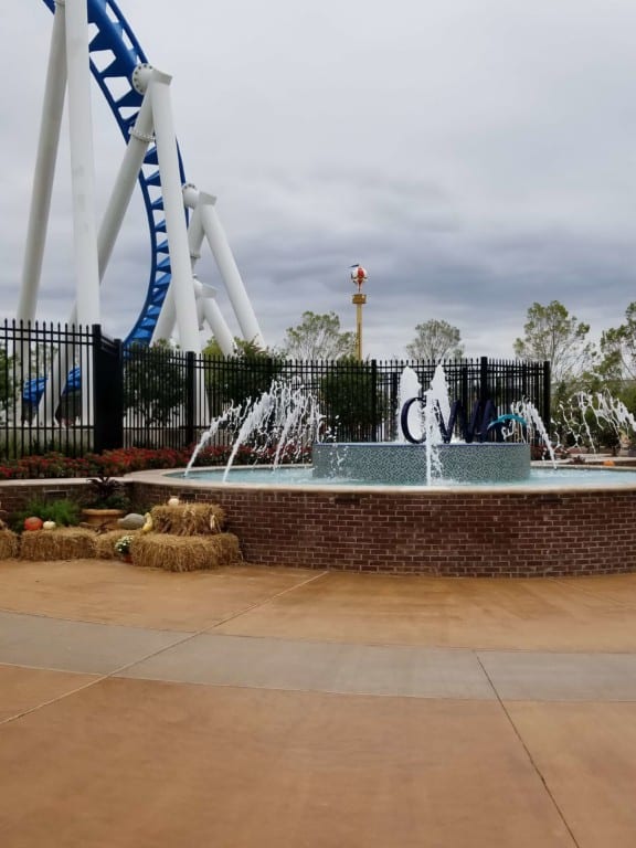 The Park at OWA fountain in front of the Rollin' Thunder Roller Coaster