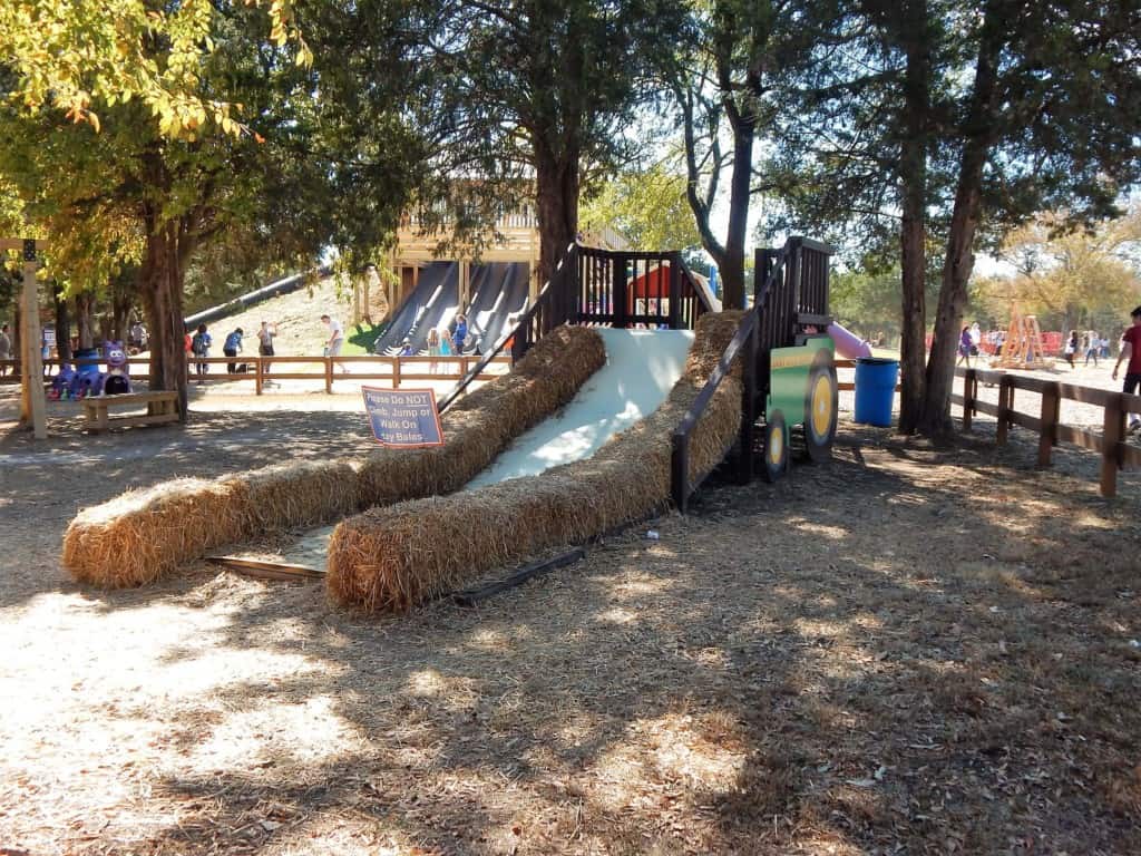 A long slide with hay bales as the sides at Lucky Ladd Farms