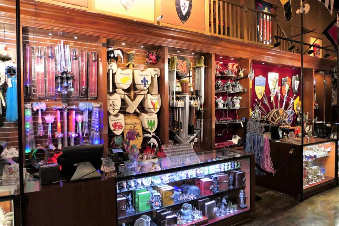 A display of swords, shields, and other souvenirs at Medieval Times