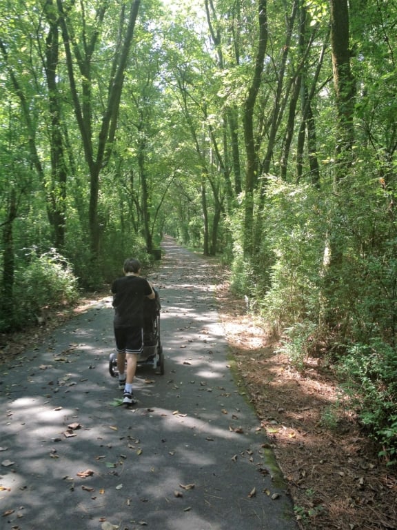 Old Hickory Lake Trail - boy pushing stroller on a paved walking trail
