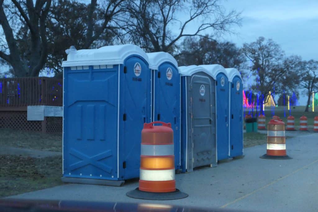 Port-a-potties are available before you enter the drive thru. 
